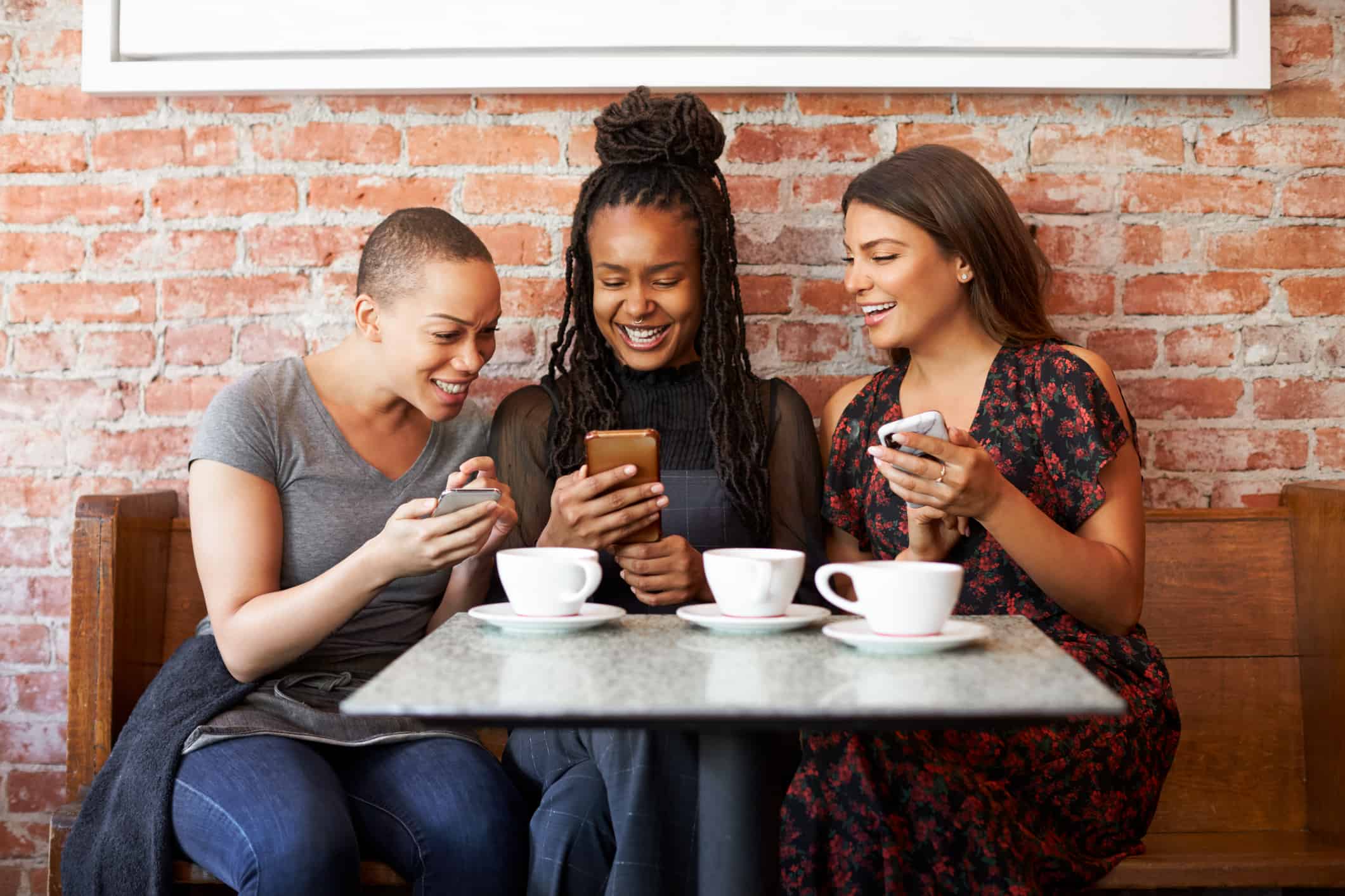 A group of women enjoying gamification and being rewarded