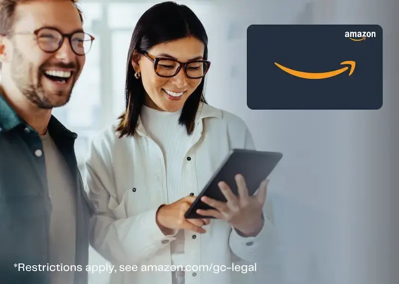 Two execs happy to receive an Amazon gift card.