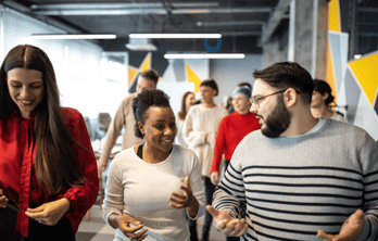 Employees after receiving gift card rewards for employee appreciation day.