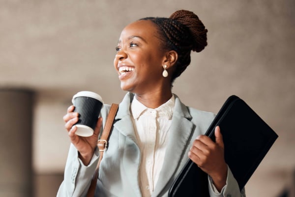 OPT Blog Image - Employee enjoying a nice cup of coffee