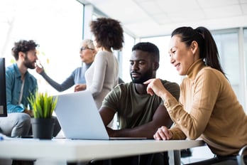 marketers working together in an office